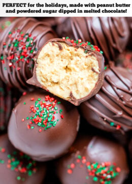 Pinterest pin with chocolate covered peanut butter balls piled on a plate with one cut in half, topped with drizzled chocolate and sprinkles on a table.