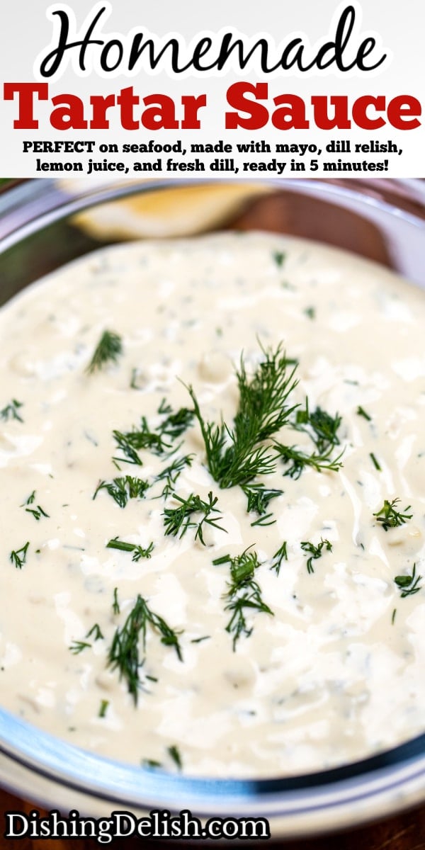Pinterest pin with a bowl of homemade tartar sauce on a cutting board, topped with fresh dill, with a lemon wedge in the background.