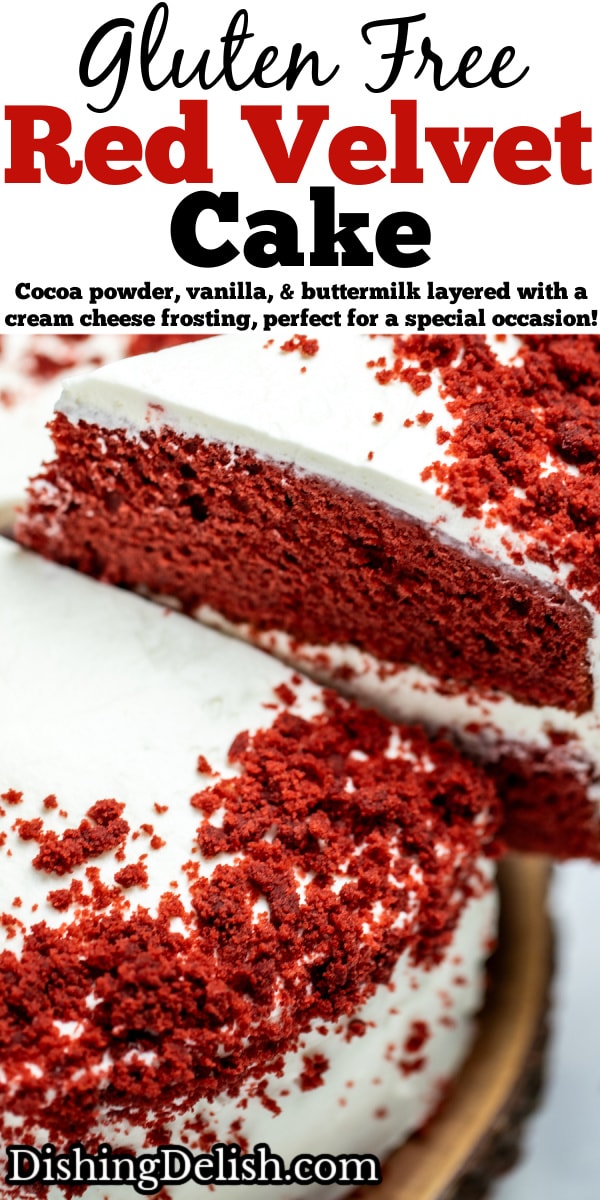 Pinterest pin with a double-layer gluten free red velvet cake on a wooden cake plate with a piece of cake being lifted up.