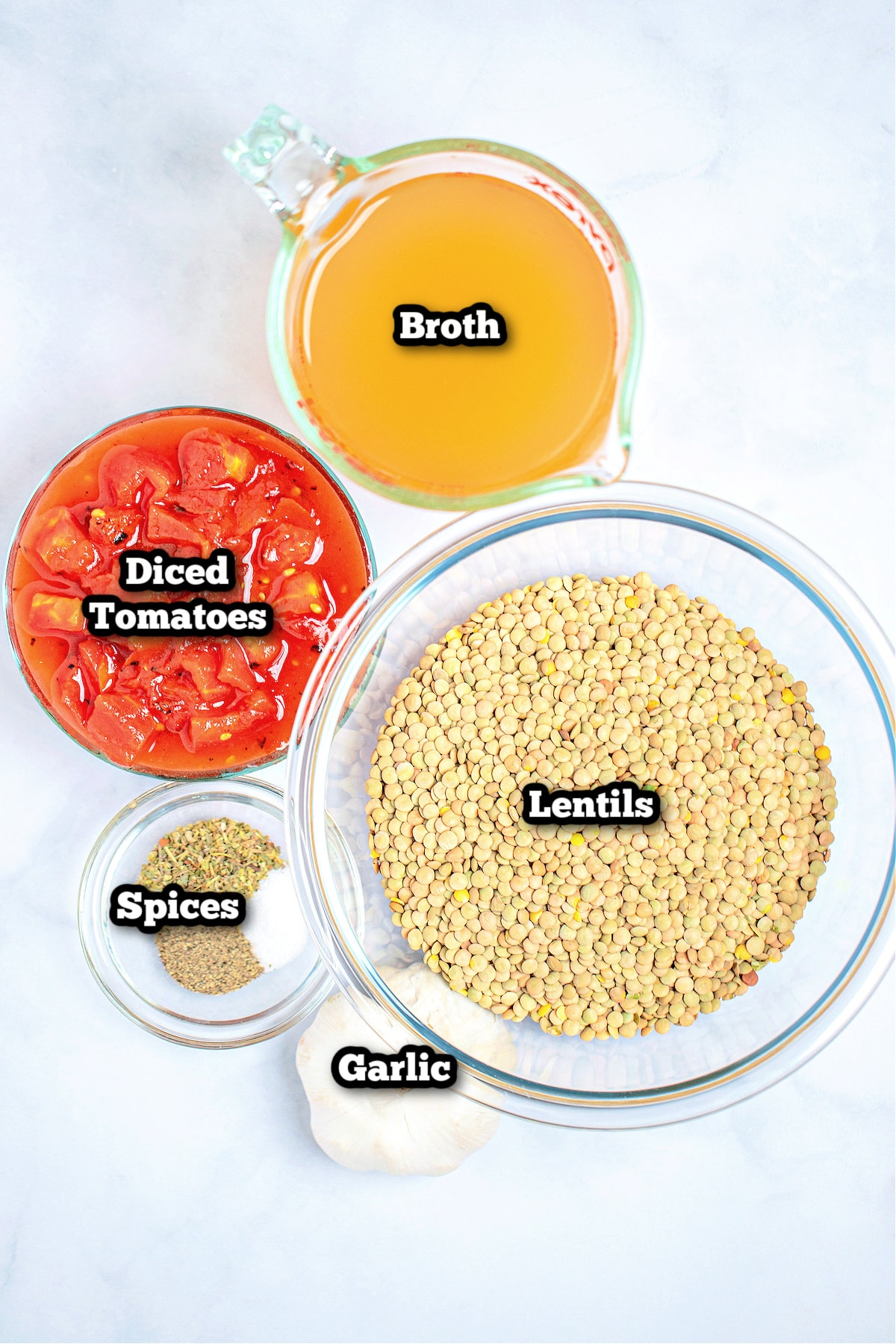 Individual ingredients for instant pot lentils on a table.