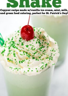 Pinterest pin with a tall glass of shamrock shake topped with whipped cream, sprinkles, and a cherry on top, and another shamrock shake in the background.