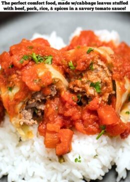 Pinterest pin with stuffed cabbage rolls cut in half on top of rice on a plate, topped with more tomato sauce.