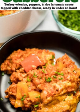 Pinterest pin with stuffed pepper casserole on a plate with a fork holding some casserole, in front of a dutch oven and a small bowl of chopped chives.