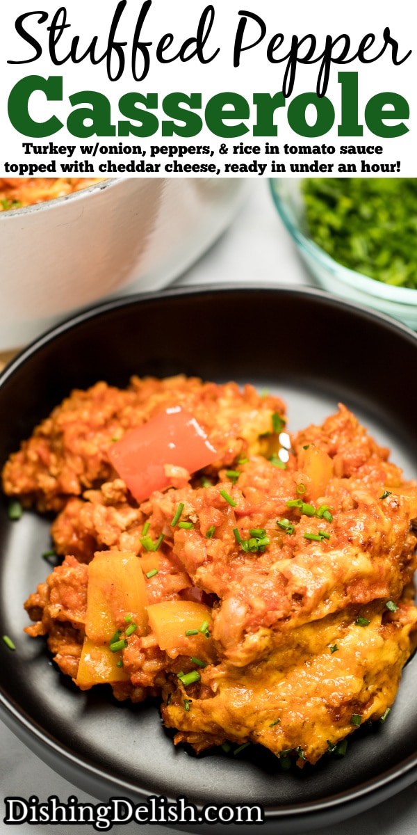Pinterest pin with stuffed pepper casserole on a plate with a fork holding some casserole, in front of a dutch oven and a small bowl of chopped chives.