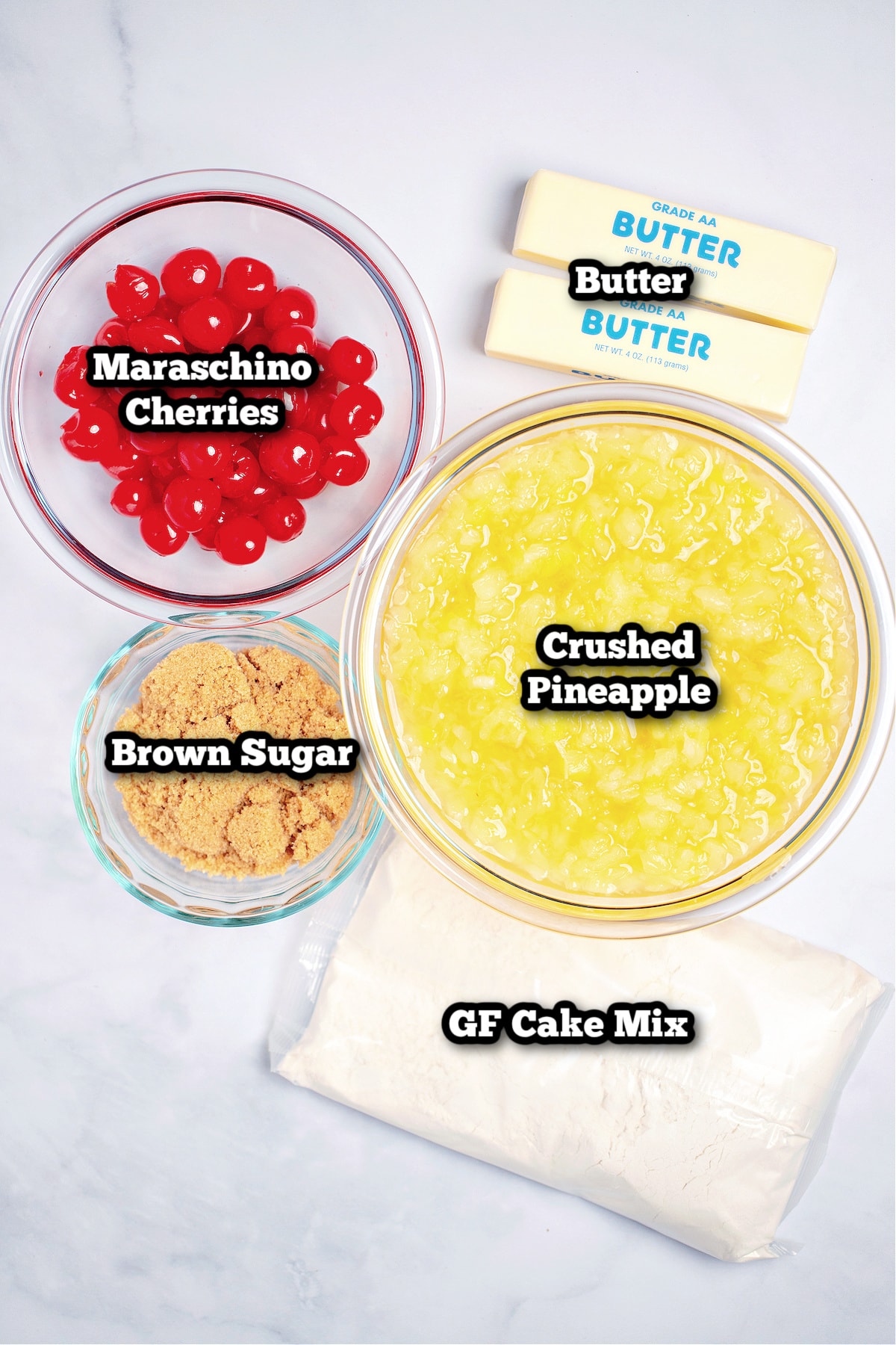 Individual ingredients for pineapple dump cake on a table.