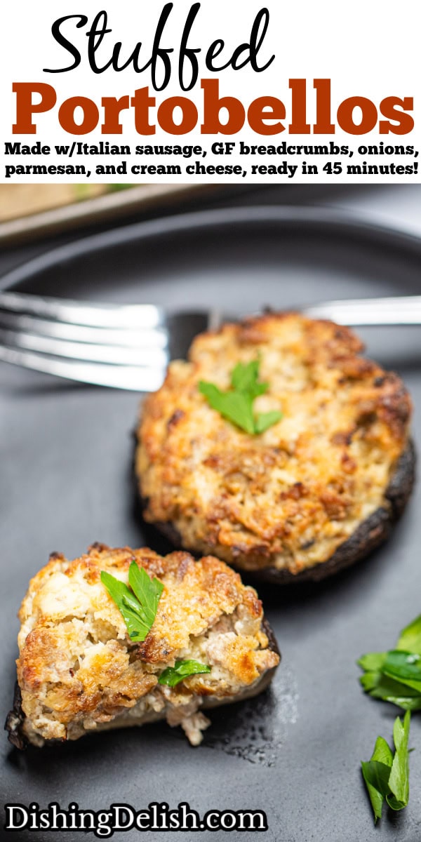 Pinterest pin with stuffed portobello mushrooms on a plate with one cut in half, topped with fresh parsley, and a fork in the background.