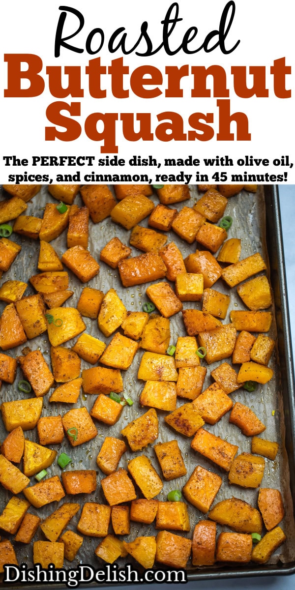 Pinterest pin with a sheet pan lined with parchment paper with a single layer of roasted butternut squash, topped with green onions.