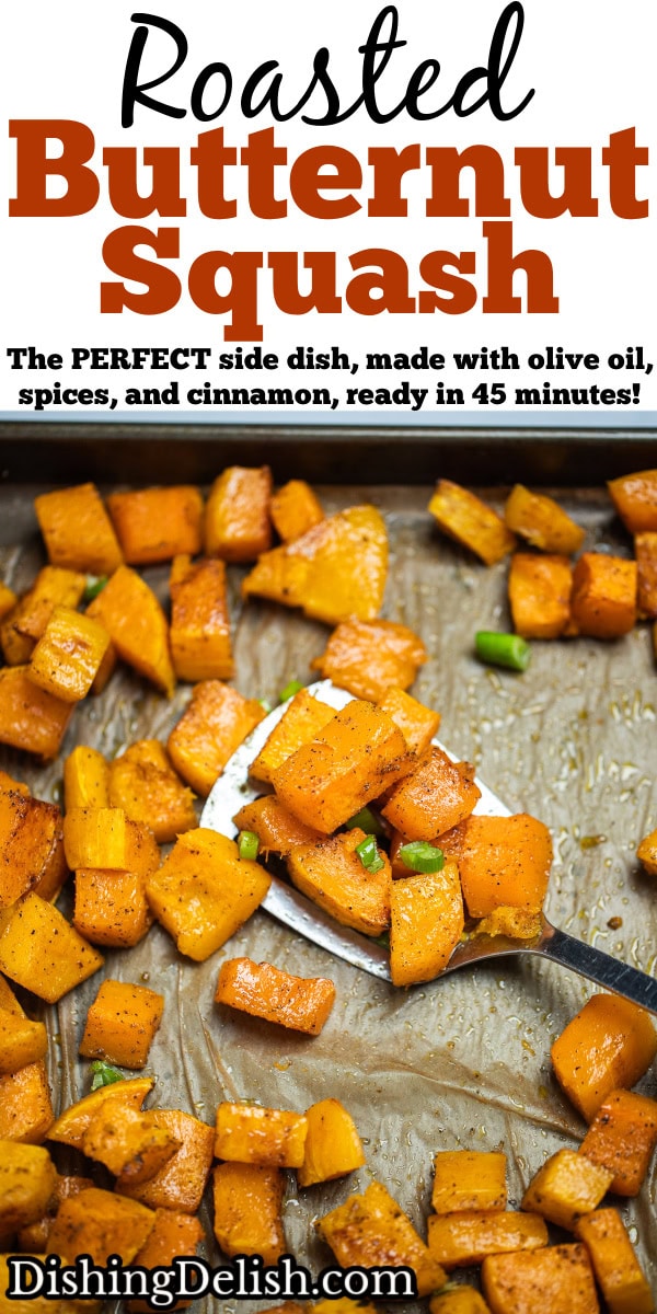 Pinterest pin with a sheet pan lined with parchment paper with a single layer of roasted butternut squash, topped with green onions, and a spatula lifting up some pieces of squash.