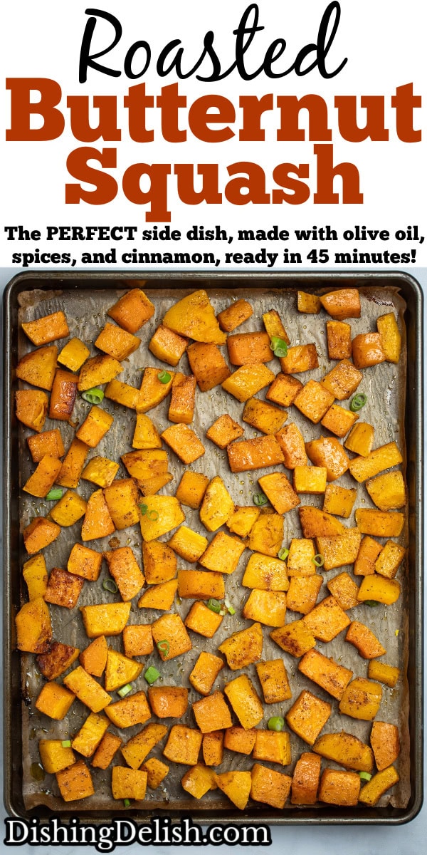 Pinterest pin with a sheet pan lined with parchment paper with a single layer of roasted butternut squash, topped with green onions.