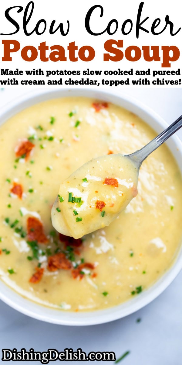 Pinterest pin with a bowl of slow cooker potato soup topped with chives and crispy bacon, with a spoon lifting up some soup.