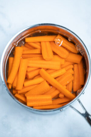 Maple Glazed Carrots • Dishing Delish