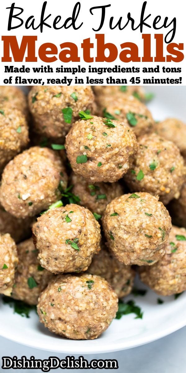 Pinterest pin with a bowl full of baked turkey meatballs topped with fresh chopped parsley, on a table.