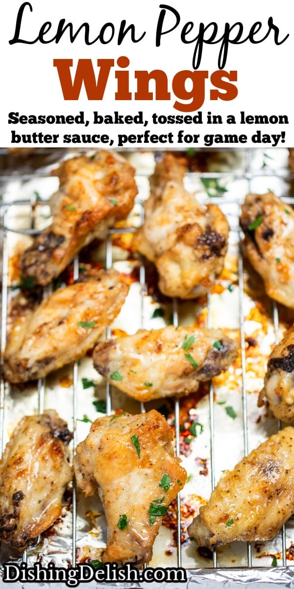Pinterest pin with a sheet pan lined with tinfoil and a baking rack with cooked lemon pepper chicken wings topped with fresh parsley.