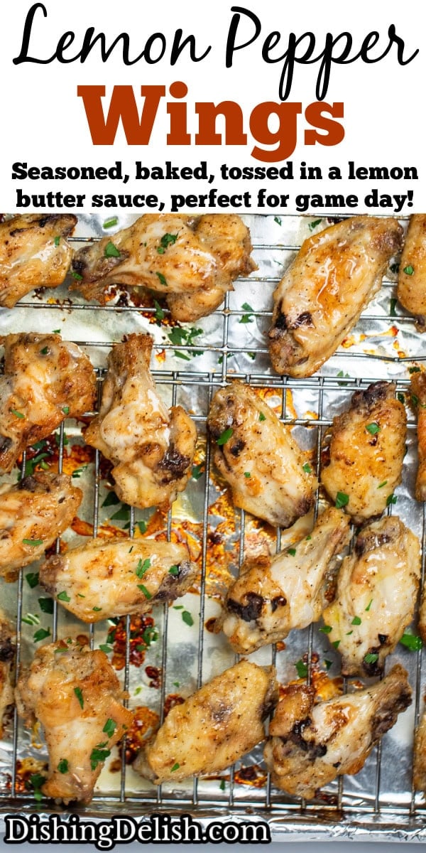 Pinterest pin with a sheet pan lined with tinfoil and a baking rack with cooked lemon pepper chicken wings topped with fresh parsley.