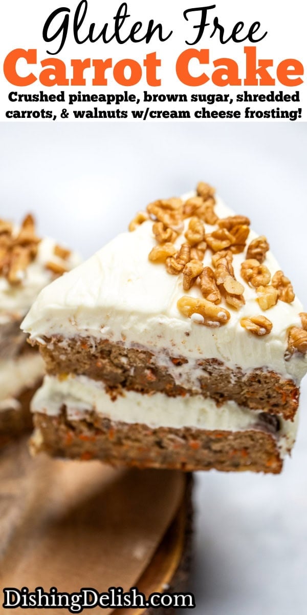 Pinterest pin with a double layer carrot cake on a wooden cake plate, with a layer of cream cheese frosting in the middle and on top, with walnuts around the edges of the top of the cake. There is a piece of cake being lifted away from the cake.