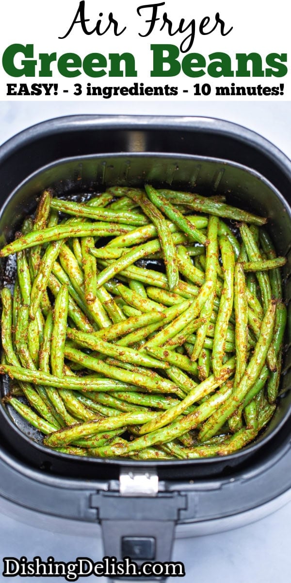 Pinterest pin with an air fryer basket with green beans air fried with olive oil and spices.
