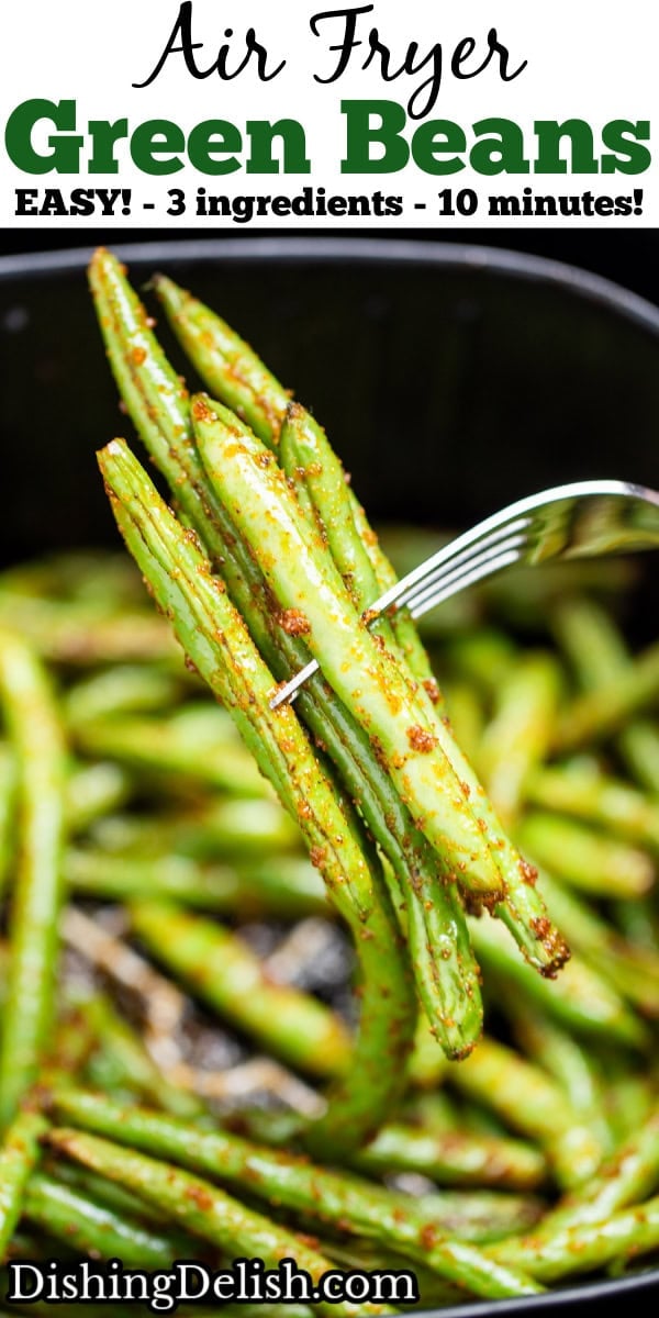 Pinterest pin with an air fryer basket with green beans air fried with olive oil and spices, with a fork holding some green beans up.