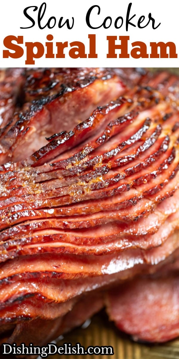 Pinterest pin with a close up of a spiral ham with the slices slightly separated from each other, on a sheet pan.
