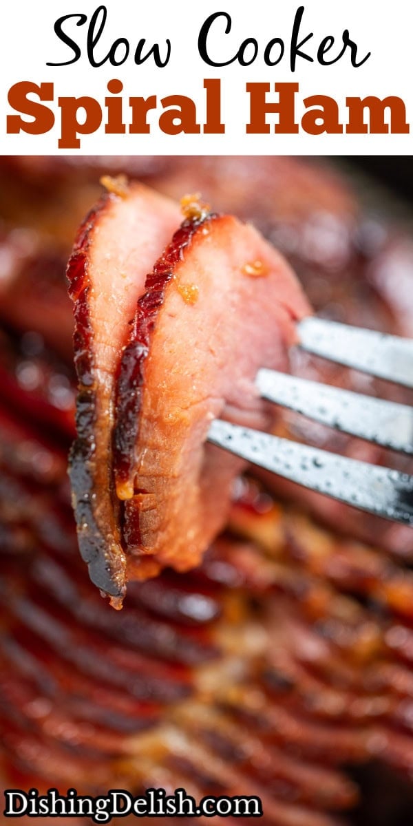 Pinterest pin with a fork lifting up two pieces of ham, above the rest of the spiral ham.