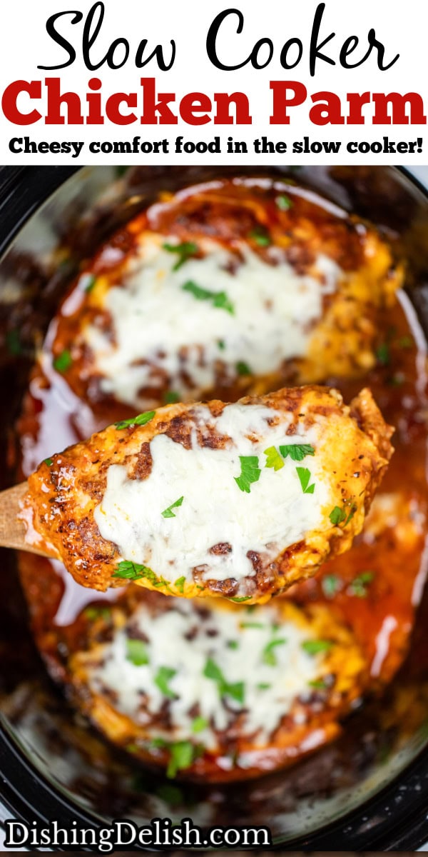 Pinterest pin with a slow cooker with three breaded chicken breasts in marinara sauce, topped with mozzarella cheese and fresh chopped parsley, and a spoon lifting one chicken breast up.