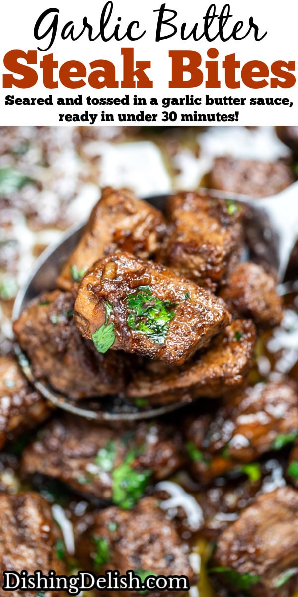Pinterest pin with garlic butter steak bites topped with fresh parsley, with a spoon lifting up steak from the pan.