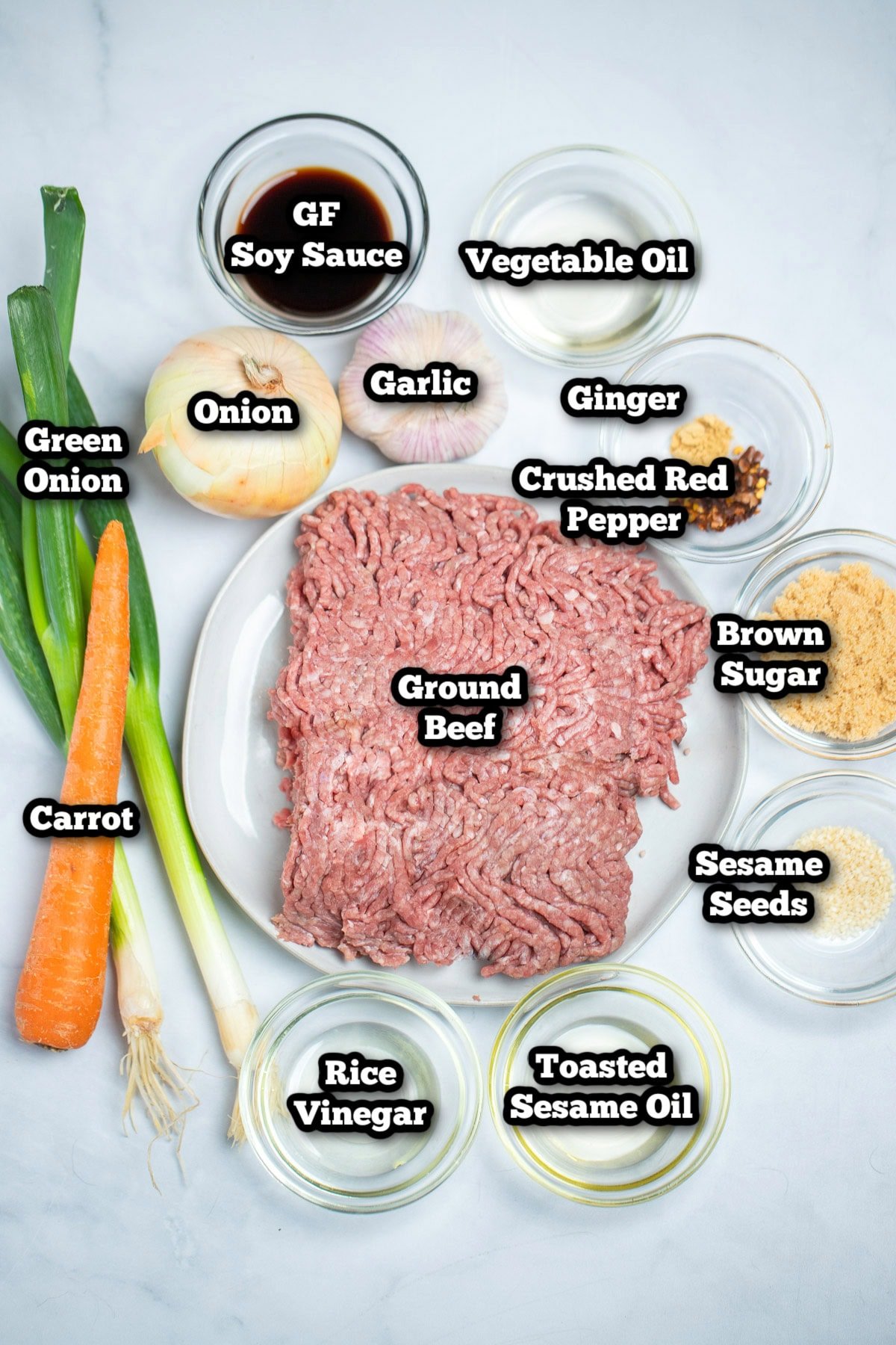 Ingredients for korean beef bowls on a white background.