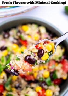 Pinterest pin with a fork lifting black bean quinoa salad from a bowl, with a larger glass bowl of salad in the background.