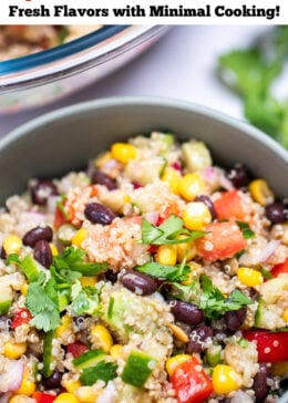 Pinterest pin with a bowl of black bean quinoa salad topped with fresh cilantro, with a larger glass bowl of salad in the background. A sprig of cilantro rests next to the smaller bowl on the table.
