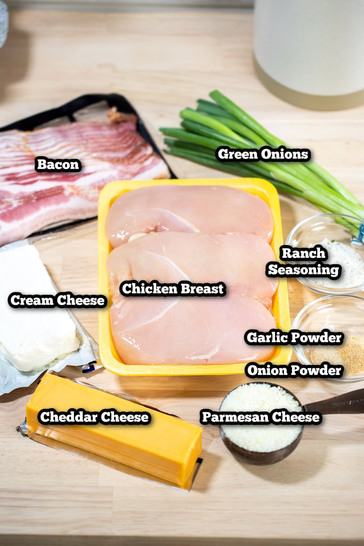 Individual ingredients for crockpot cream cheese chicken on the kitchen counter.