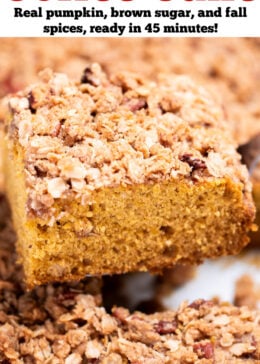 Pinterest pin with a spatula lifting a piece of pumpkin coffee cake out of the baking dish.