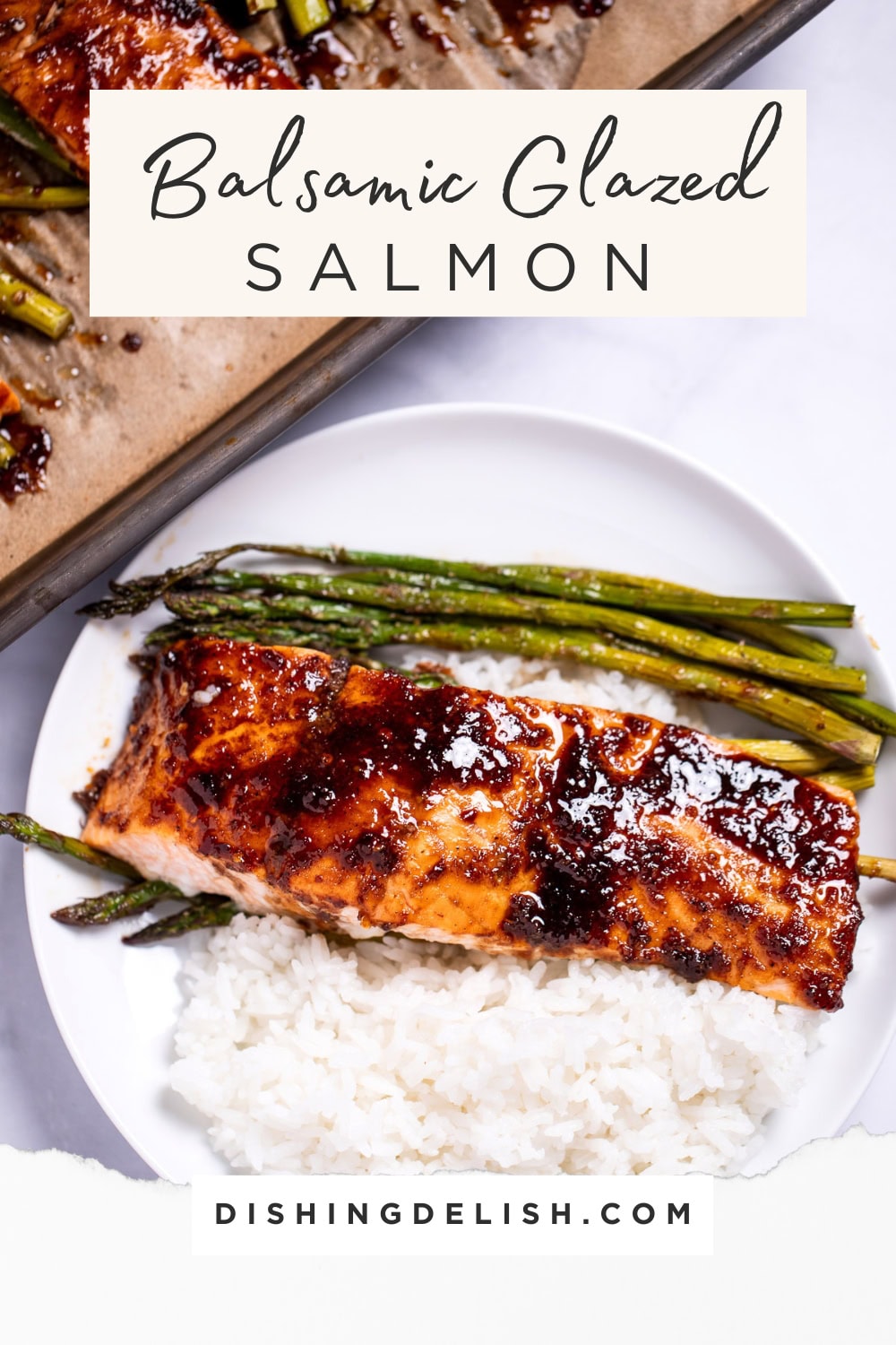 Pinterest pin with a plate with a balsamic glazed salmon fillet resting on top of rice and asparagus, with a sheet pan in the background.