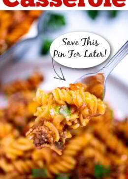 Pinterest pin with a fork holding pasta and ground beef topped with fresh parsley, over a plate of cheeseburger casserole, with the casserole skillet and fresh parsley in the background.