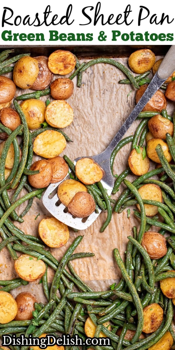 Pinterest pin with a sheet pan lined with parchment paper with roasted green beans and potatoes with olive oil and spices, topped with fresh parsley, and a spatula resting on the sheet pan.