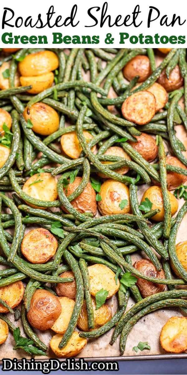 Pinterest pin with a sheet pan lined with parchment paper with roasted green beans and potatoes with olive oil and spices, topped with fresh parsley.