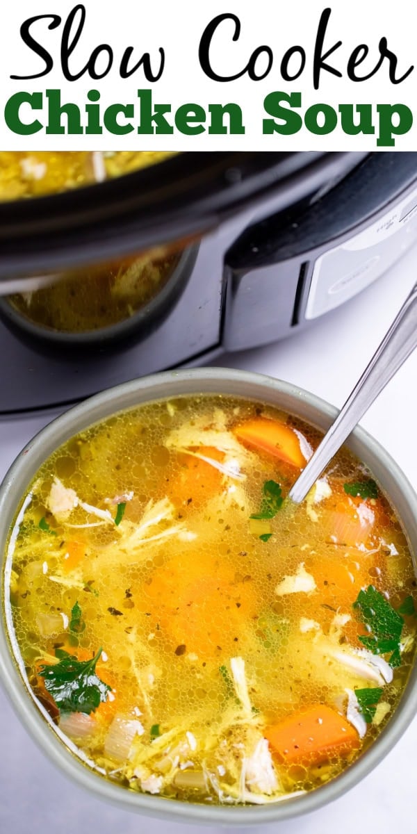 Pinterest pin with a bowl of chicken soup on a table with a spoon in it, in front of a slow cooker of soup.