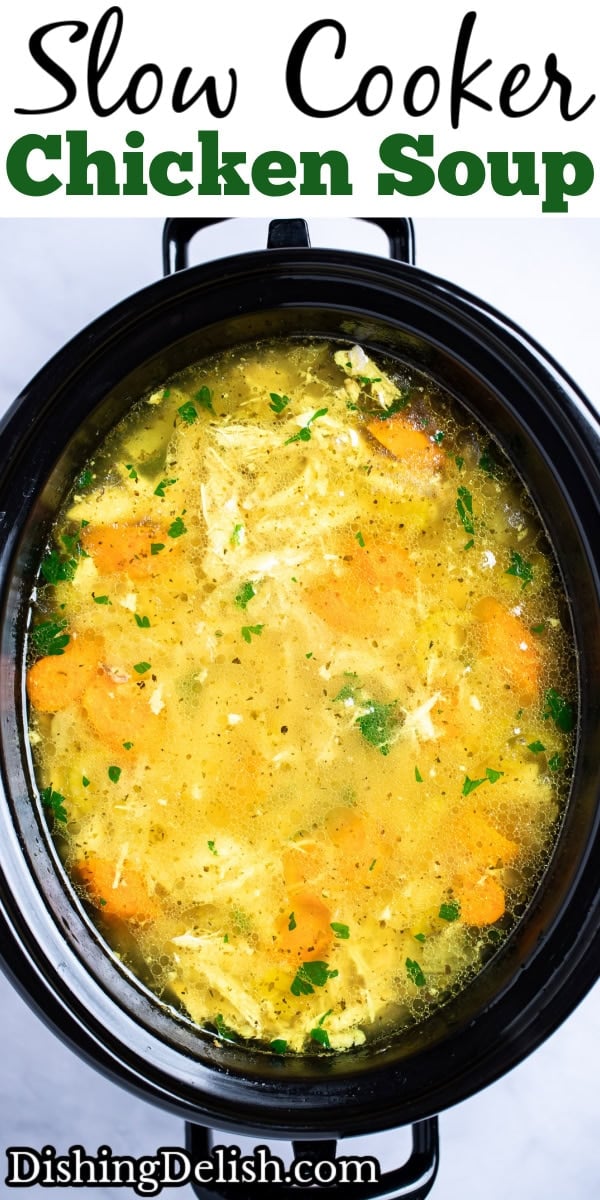 Pinterest pin with a slow cooker full of chicken soup topped with fresh parsley on a table.