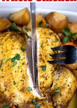 Pinterest pin with a knife and fork holding a chicken breast up after carving it from a whole chicken.