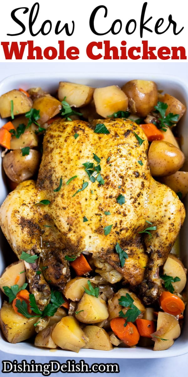 Pinterest pin with a whole chicken, broiled until crispy, resting on top of potatoes and carrots in a baking dish, topped with fresh parsley.