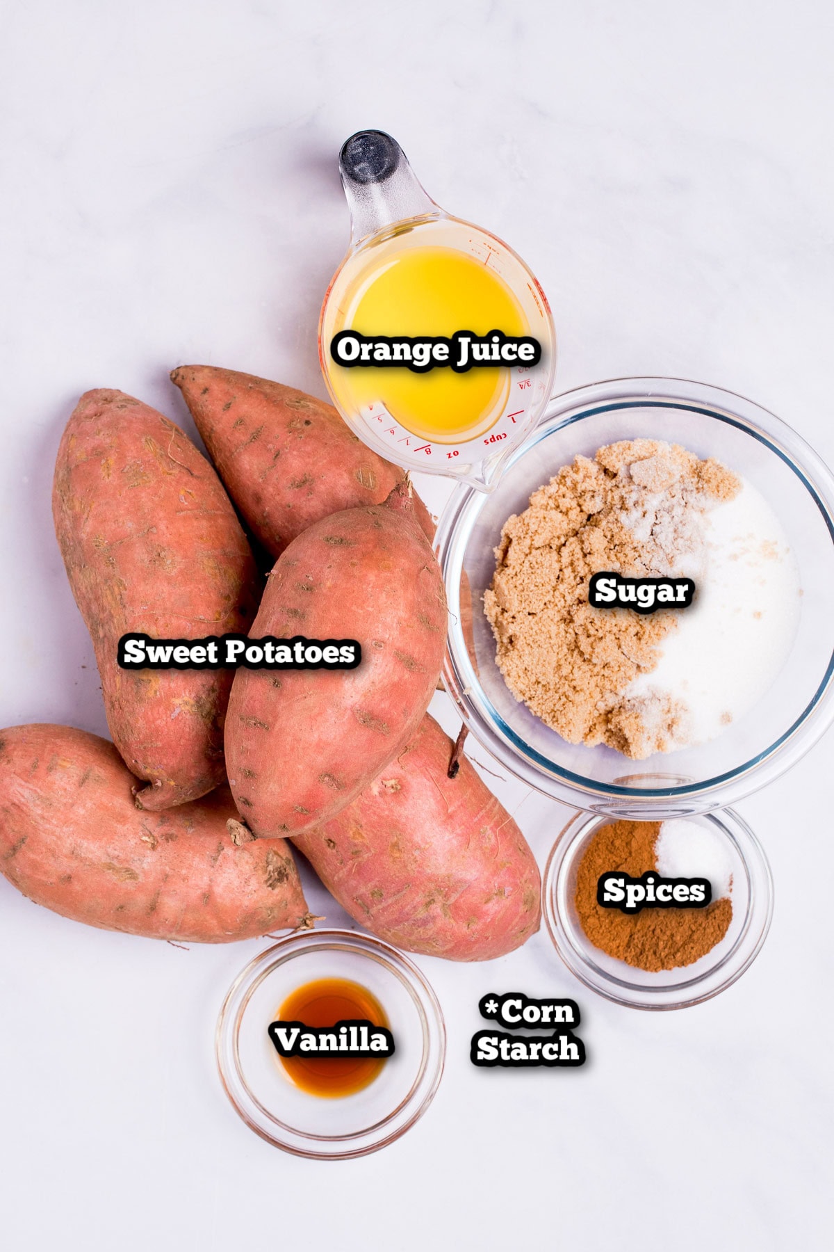 Individual ingredients for candied sweet potatoes on a table.