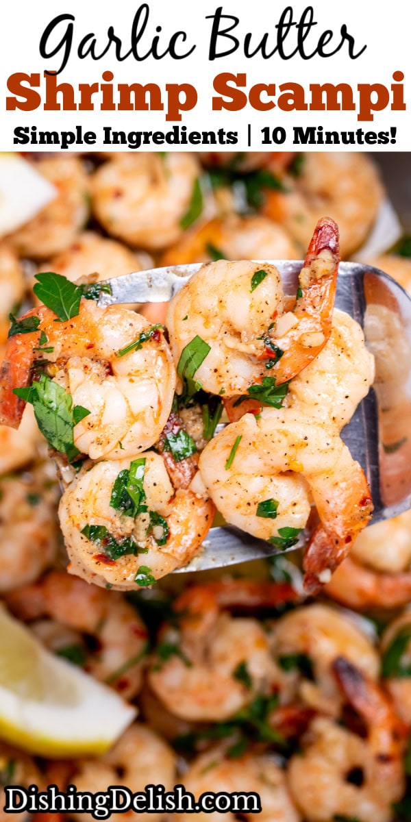 Pinterest pin with a nonstick skillet with cooked shrimp in garlic and butter with fresh parsley and two lemon wedges in the skillet, with a spatula lifting some up.