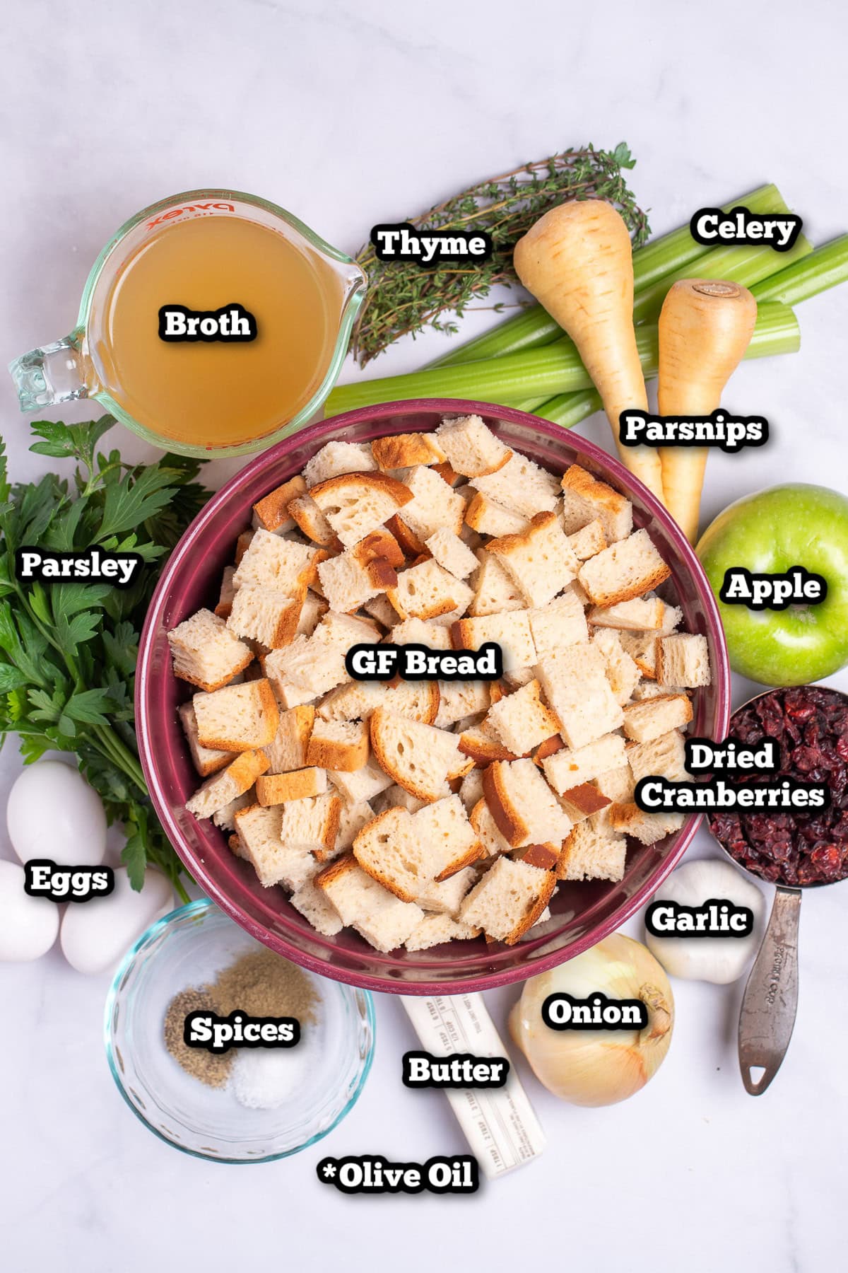 Individual ingredients for gluten free stuffing on a table.