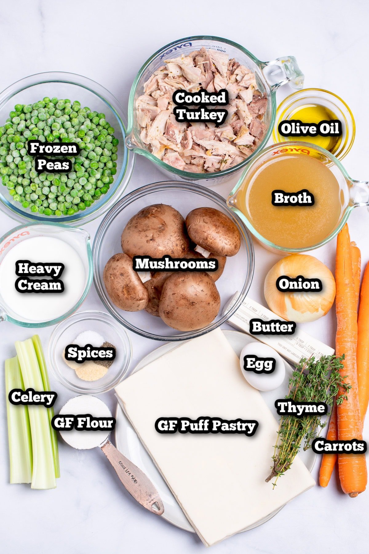 Individual ingredients for leftover turkey pot pie casserole on a table.