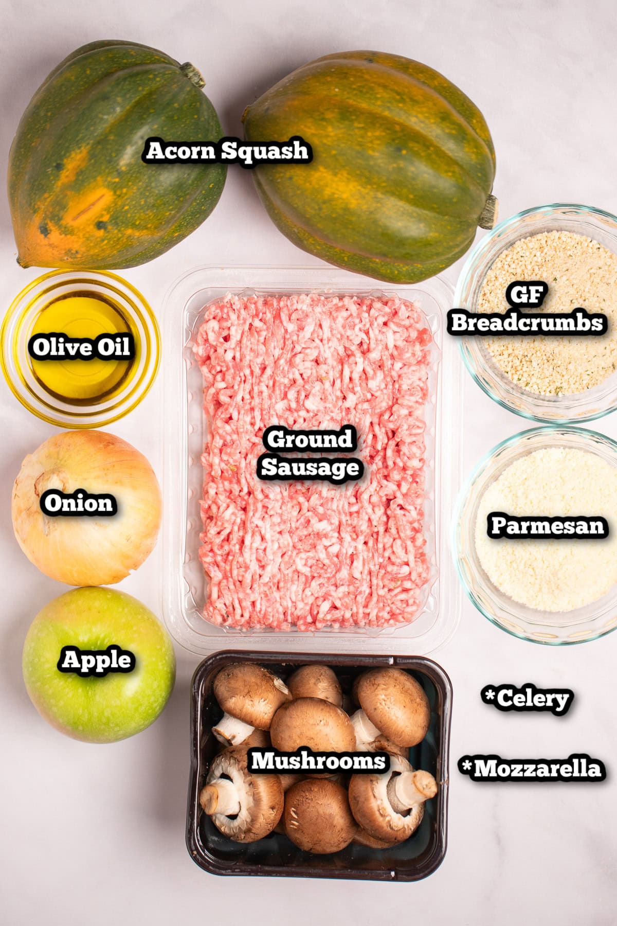 Individual ingredients for stuffed acorn squash on a table.
