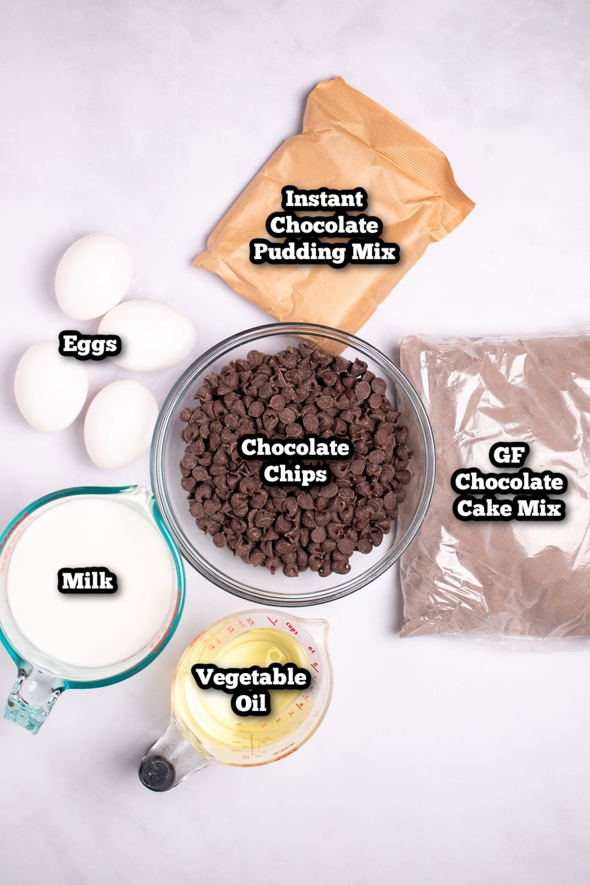 Individual ingredients for crockpot chocolate lava cake on a table.