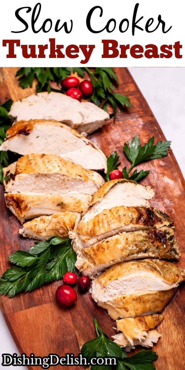 Pinterest pin with a cutting board with sliced turkey breast next to parsley and cranberries.