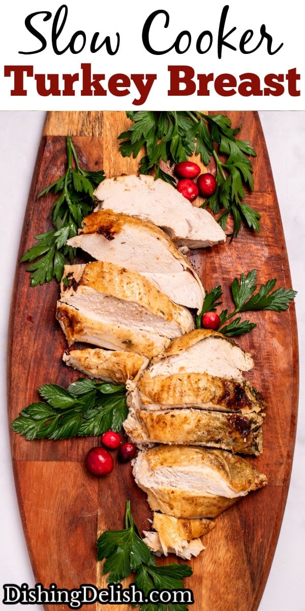 Pinterest pin with a cutting board with sliced turkey breast next to parsley and cranberries.