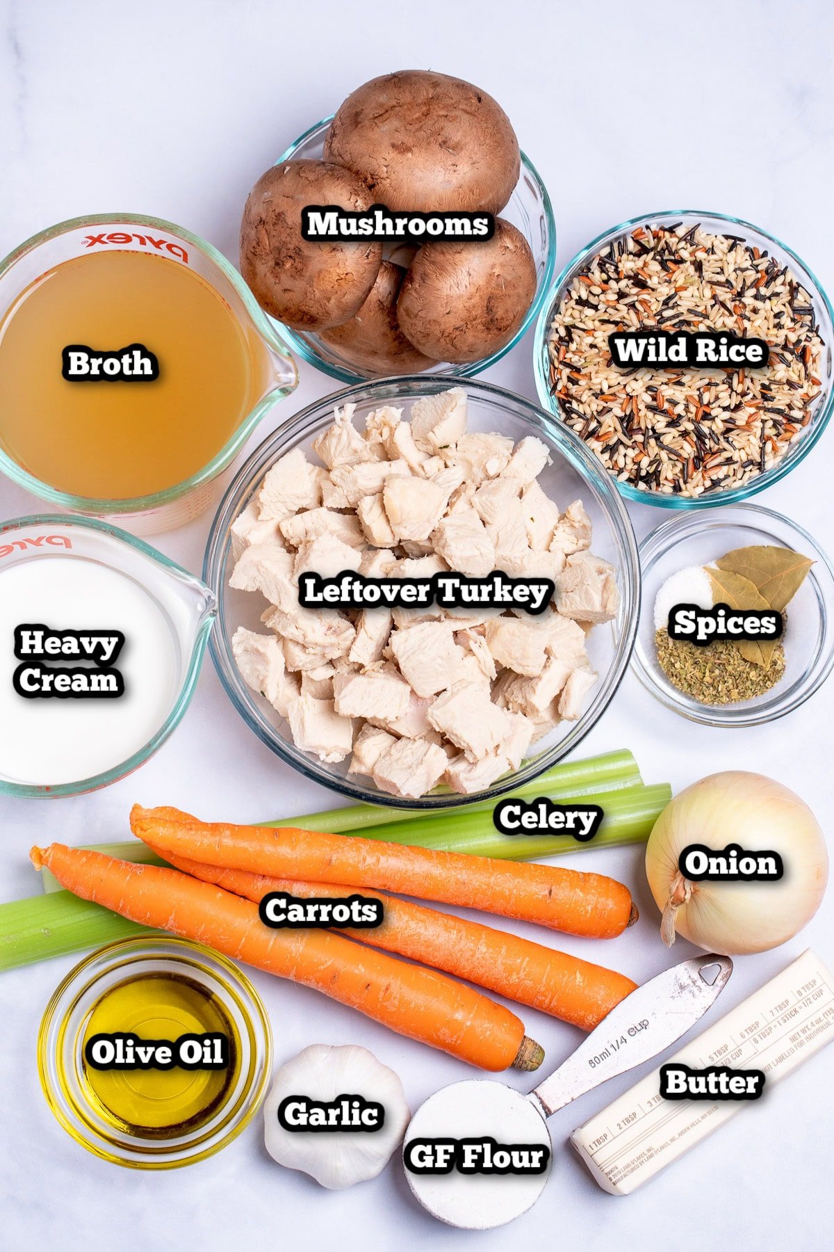 Individual ingredients for leftover turkey wild rice soup on a table.