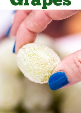 Pinterest pin with a hand holding a sugared grape.