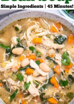 Pinterest pin with a bowl of white bean chicken soup topped with fresh parsley.