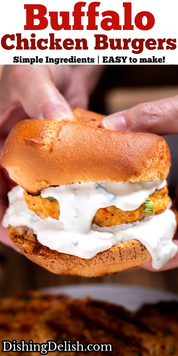 Pinterest pin with a buffalo chicken burger with blue cheese dripping from the burger, and two hands holding the burger from the back.